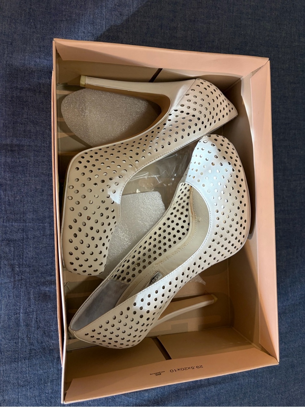 Perforated High Heel Pumps in Off-White